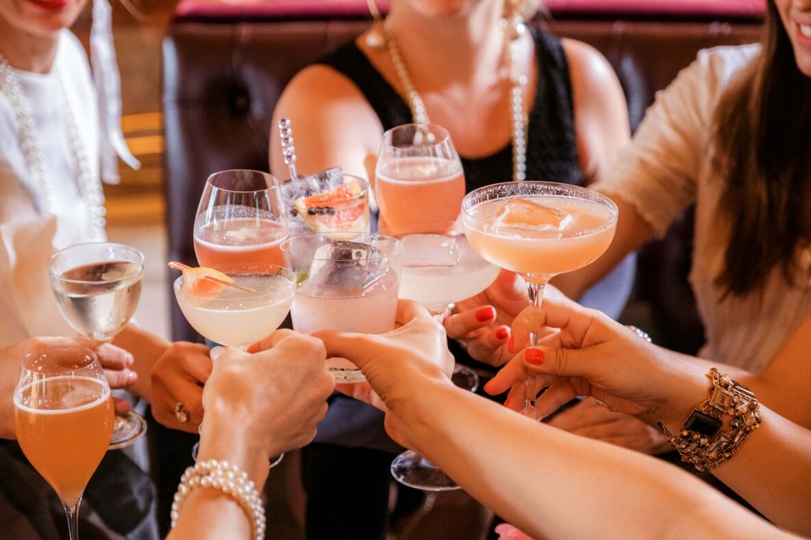 A group of friends enjoying cocktails together.